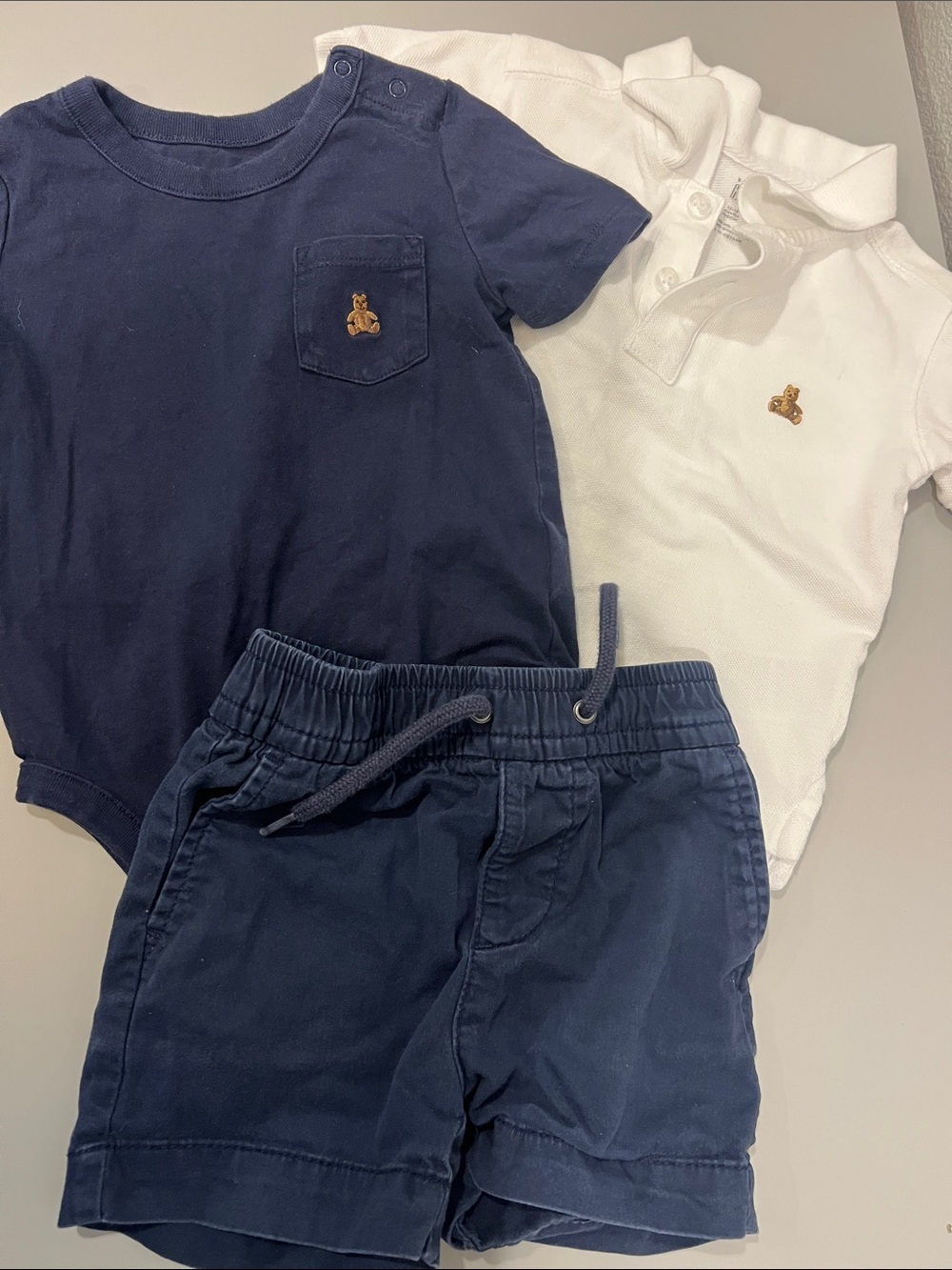 Gap Lot - A collared shirt, onesie, and shorts from Gap